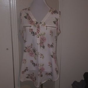 Sleeveless with pink rose print.